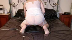 Thumbnail of Sissy Slut Takes A Bath In White Erotic Ladies Lingerie And Then Ejaculates In Nylons