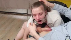 Thumbnail of Ritzy Rain Takes A Deepthroat Exam On Top Of Mirror And Gets Throat Fucked With O-Ring Mouth Gag