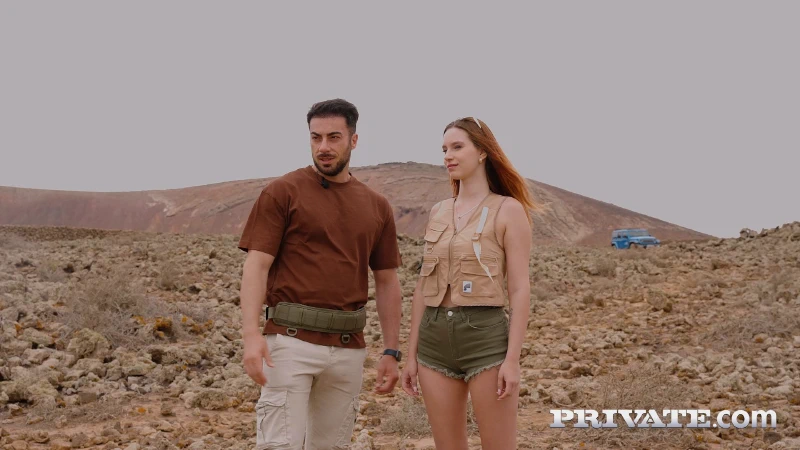 Leya Desantis and Francis X look out over a volcano